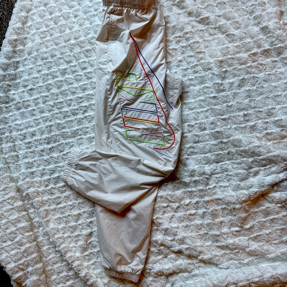 White Nike Track Pants with Multicolor Stripes